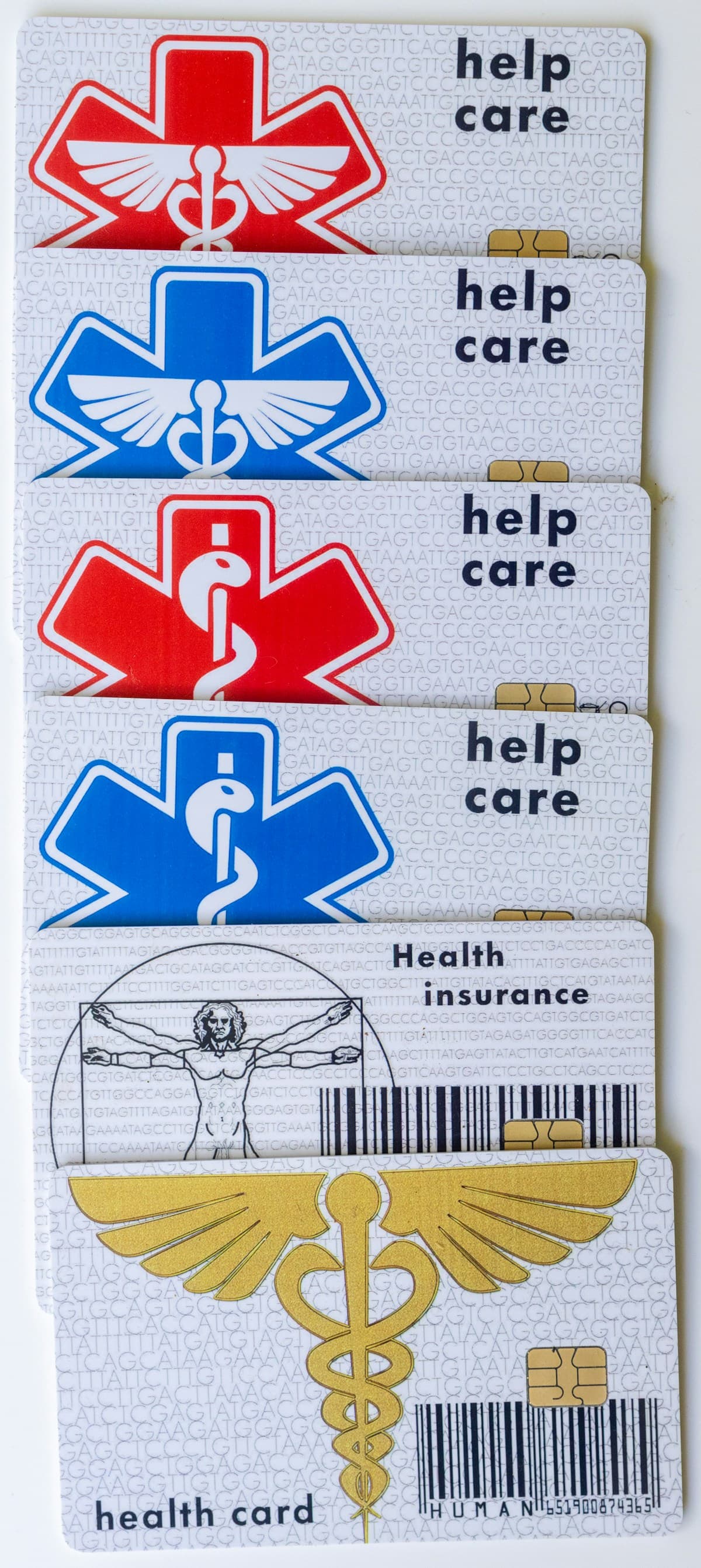 Medical identification cards with healthcare symbols; illustrative editorial photography
