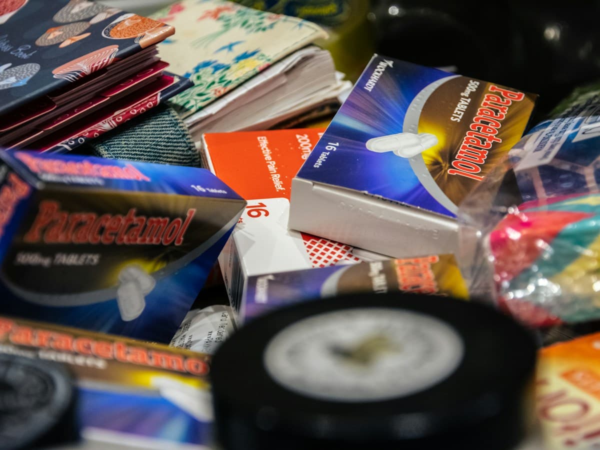 A collection of playing cards spread across a table; illustrative editorial photography