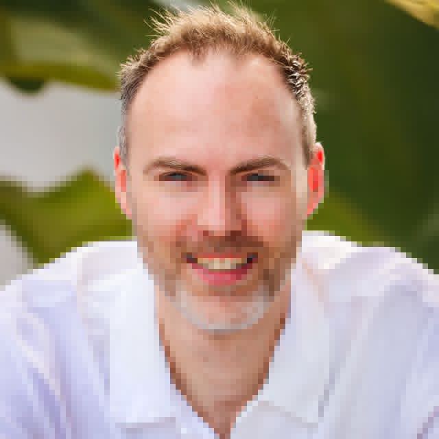 Portrait of Bjorn smiling outdoors